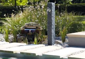 Installez la fontaine imitation bois de Jardin et Saisons